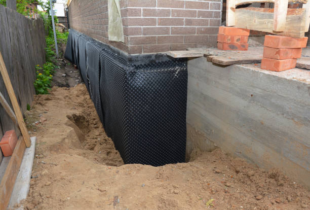 Happy homeowners after waterproofing job in West Mansfield